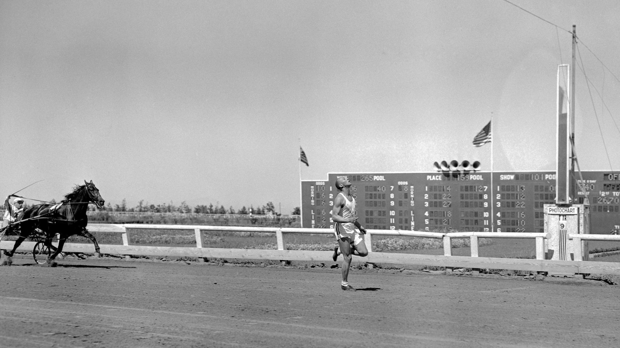 Jesse Owens beats a horse and trap in a race in 1948