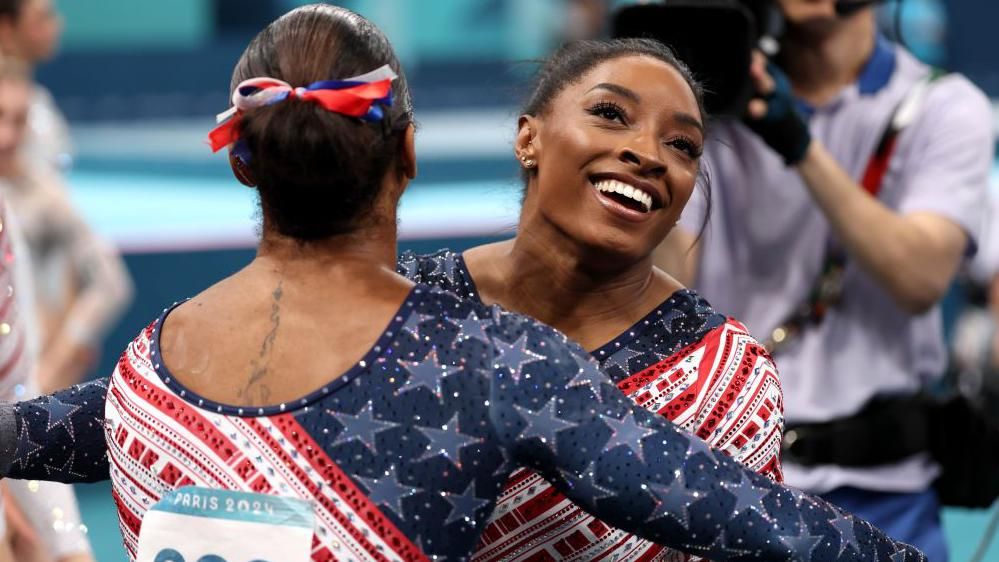 Simone Biles celebrates