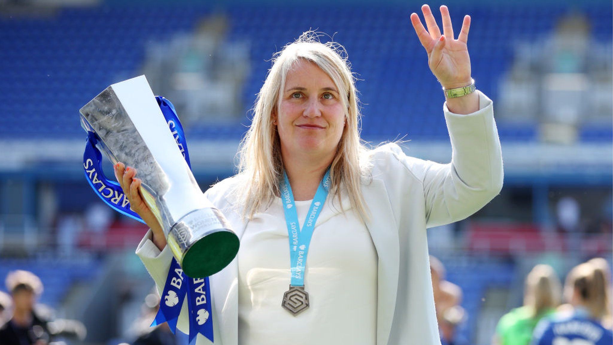 Emma Hayes waves to Chelsea fans