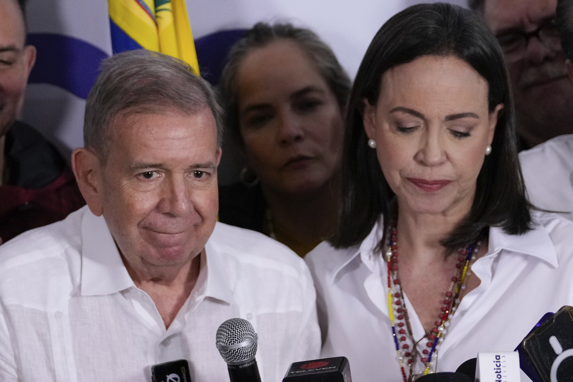 Opposition leader Maria Corina Machado, right, and presidential candidate Edmundo Gonzalez hold a press conference after electoral authorities declared President Nicolas Maduro the winner of the presidential election in Caracas, Venezuela, Monday, July 29, 2024. (AP Photo/Matias Delacroix)