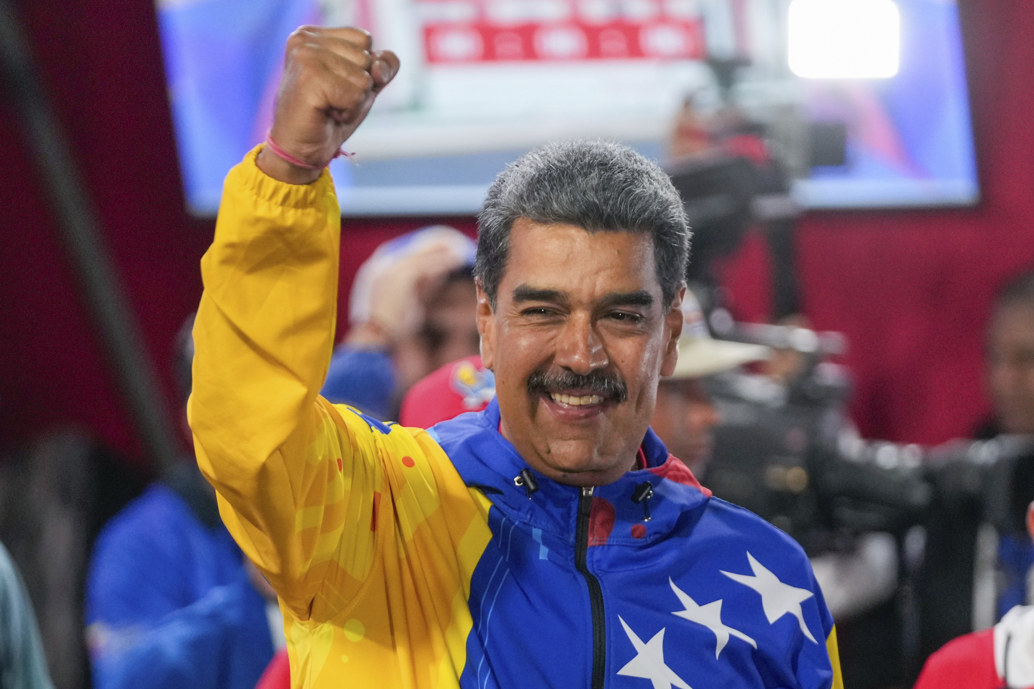 President Nicolas Maduro addresses supporters after electoral authorities declared him the winner of the presidential election in Caracas, Venezuela, Monday, July 29, 2024. (AP Photo/Fernando Vergara)