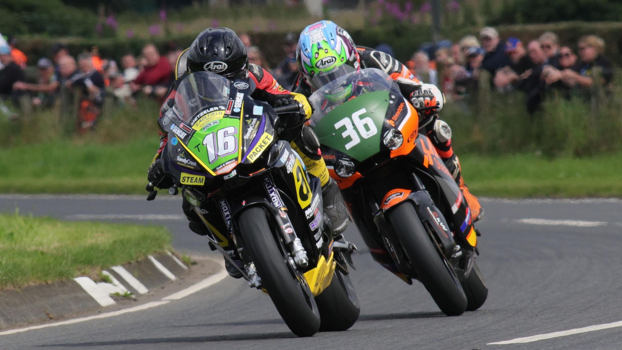 Mike Browne leads eventual Supertwins race winner Jamie Coward