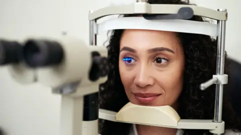 Getty Images Woman having her eyes tested