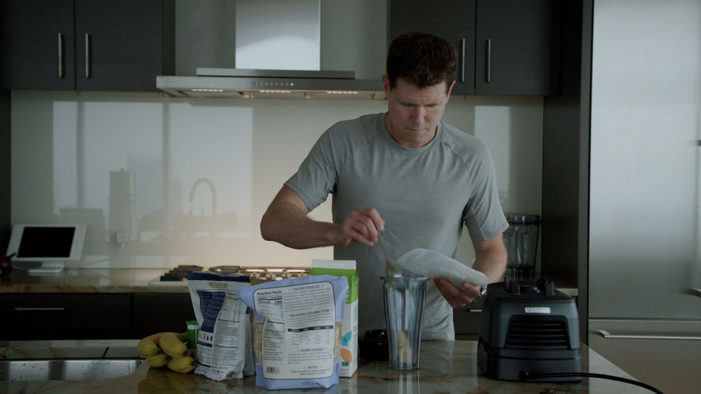 Jason Buechel making his morning smoothie.