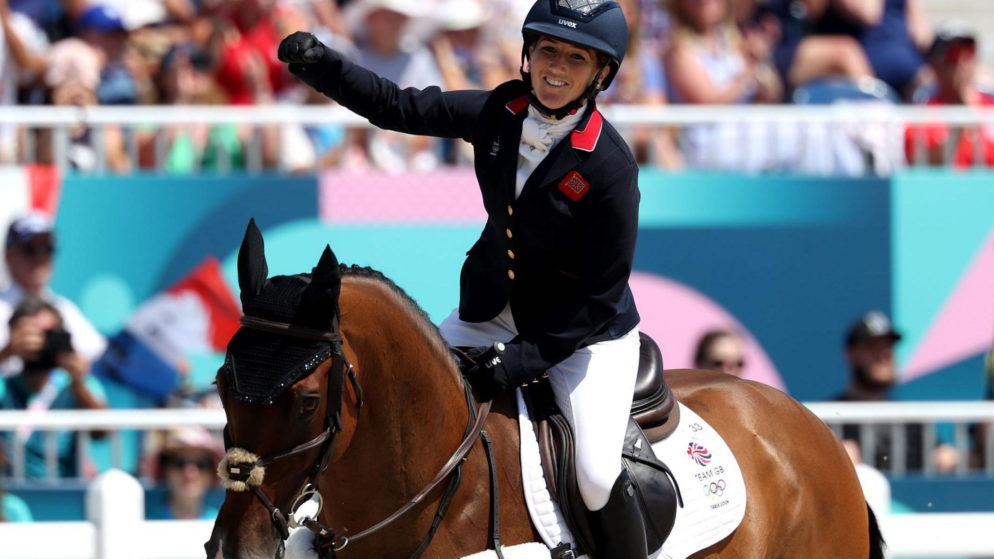 Laura Collett celebrates