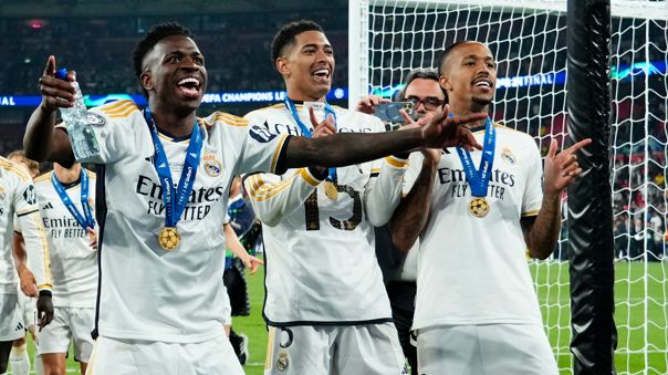 Vinicius Junior, Jude Bellingham and Eder Militao celebrate after winning the Champions League last season