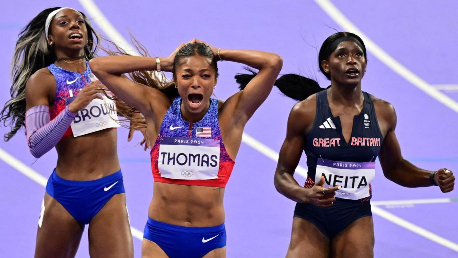 Gabby Thomas celebrates winning Olympic 200m gold