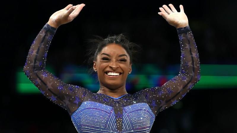 Simone Biles celebrates