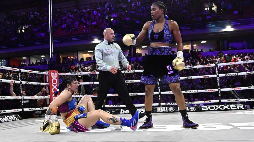 Maira Moneo on the canvas after being floored by Caroline Dubois