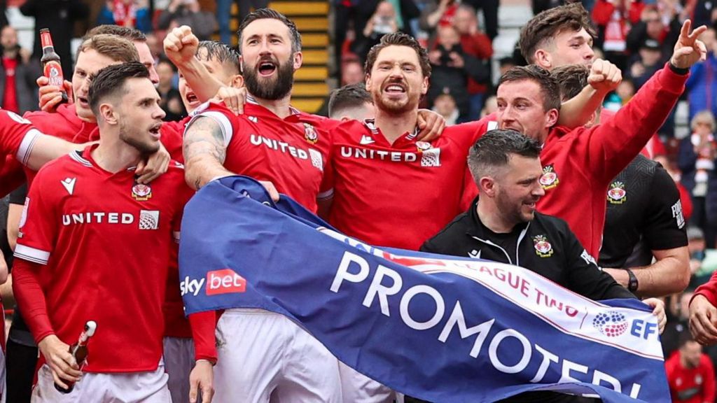 Wrexham players celebrate League Two promotion