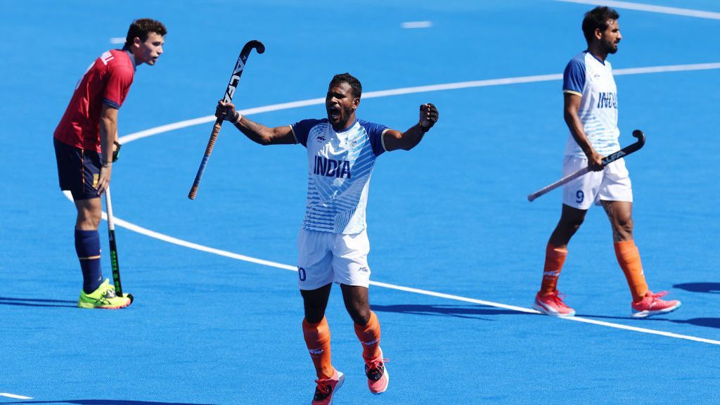 Amit Rohidas of Team India celebrates victory in the Men's Bronze Medal match between India and Spain