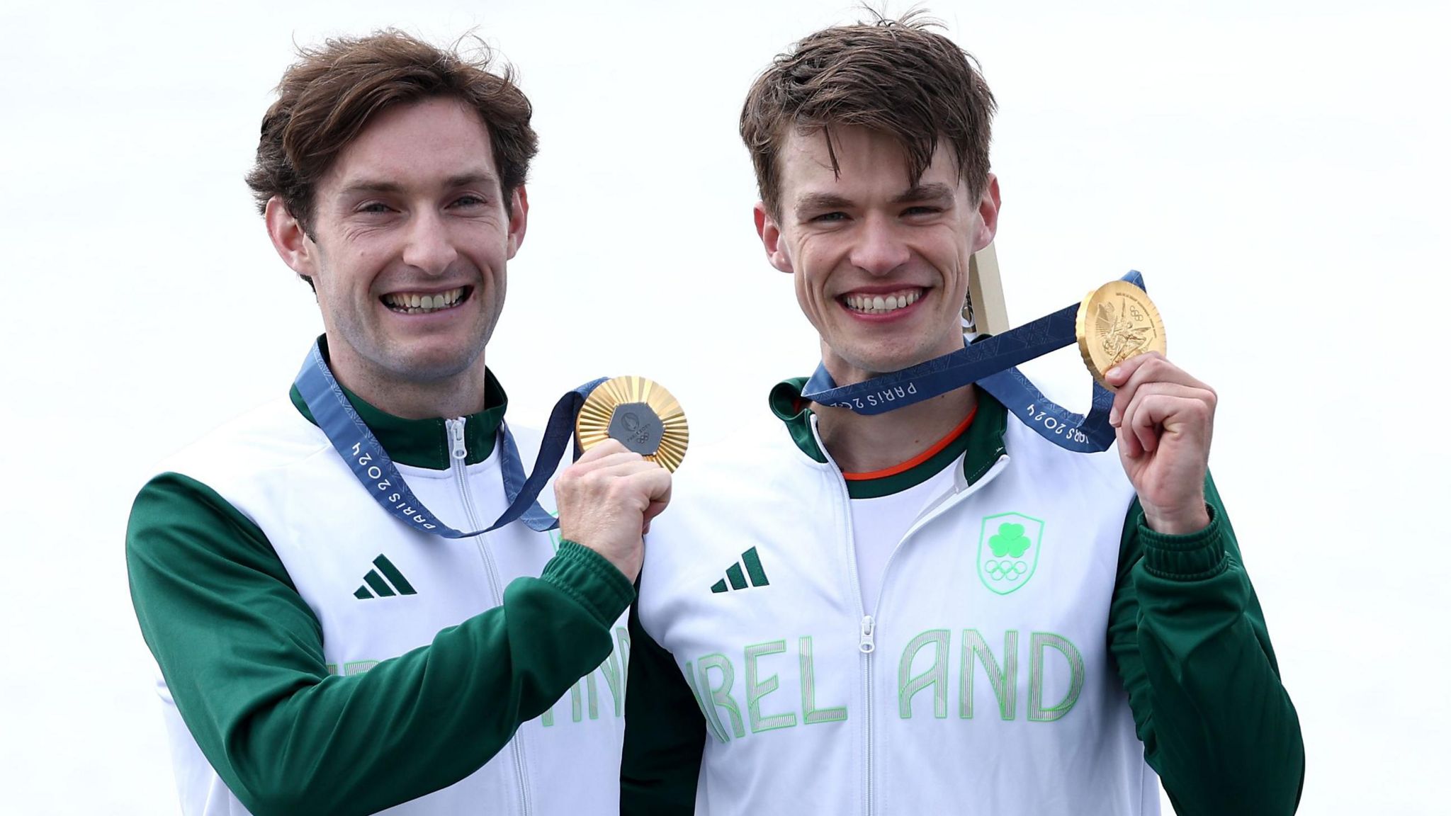 Ireland's Paul O'Donovan and Fintan McCarthy pose with their lightweight double sculls gold medals