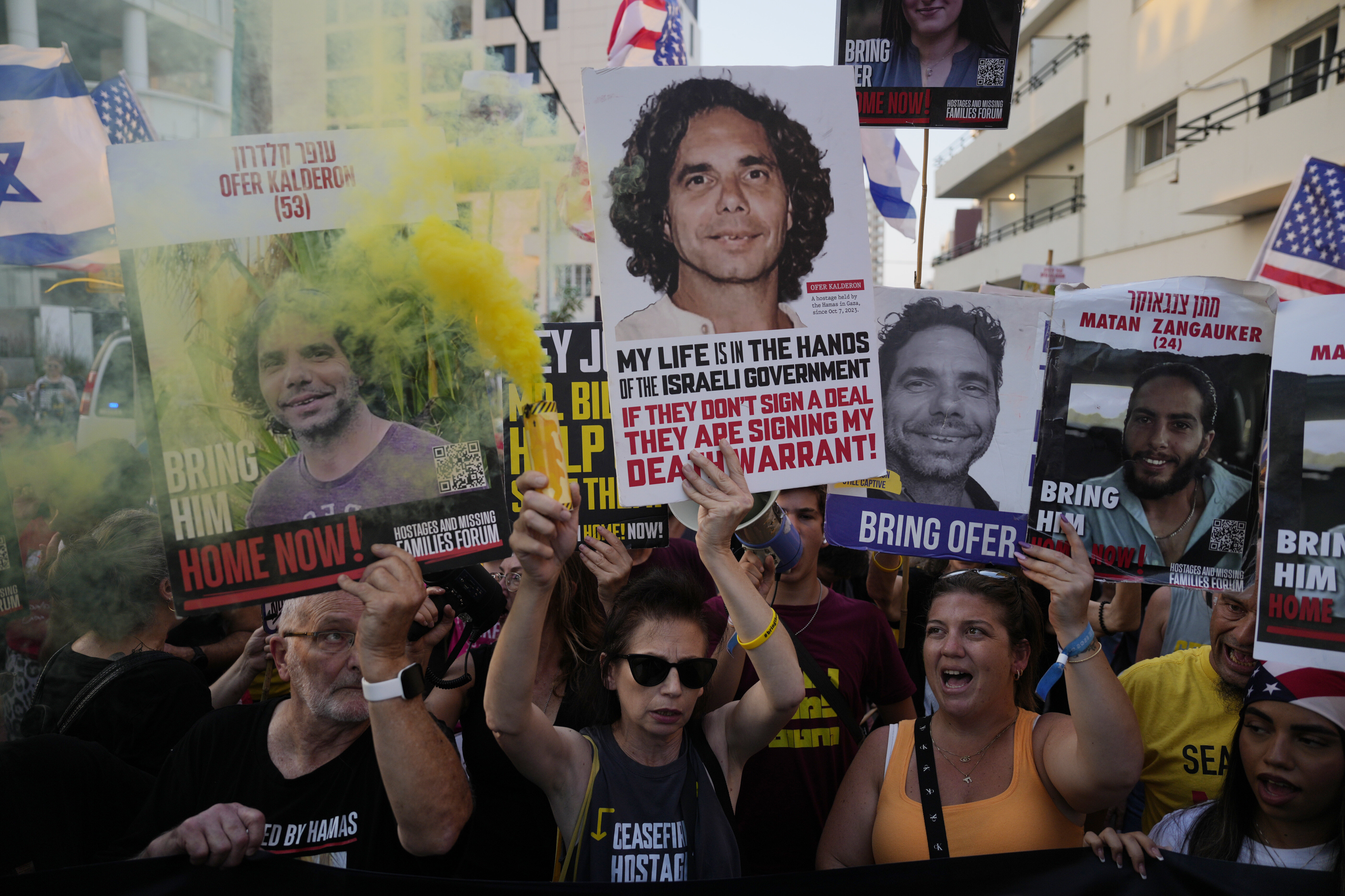 Relatives of hostages held by Hamas in the Gaza Strip and their supporters protest near the hotel where U.S. Secretary of State Antony Blinken is staying during his visit with Israeli Prime Minister Benjamin Netanyahu and leadership about a deal to halt the war in Gaza and free the hostages, in Tel Aviv, on Aug. 19, 2024.