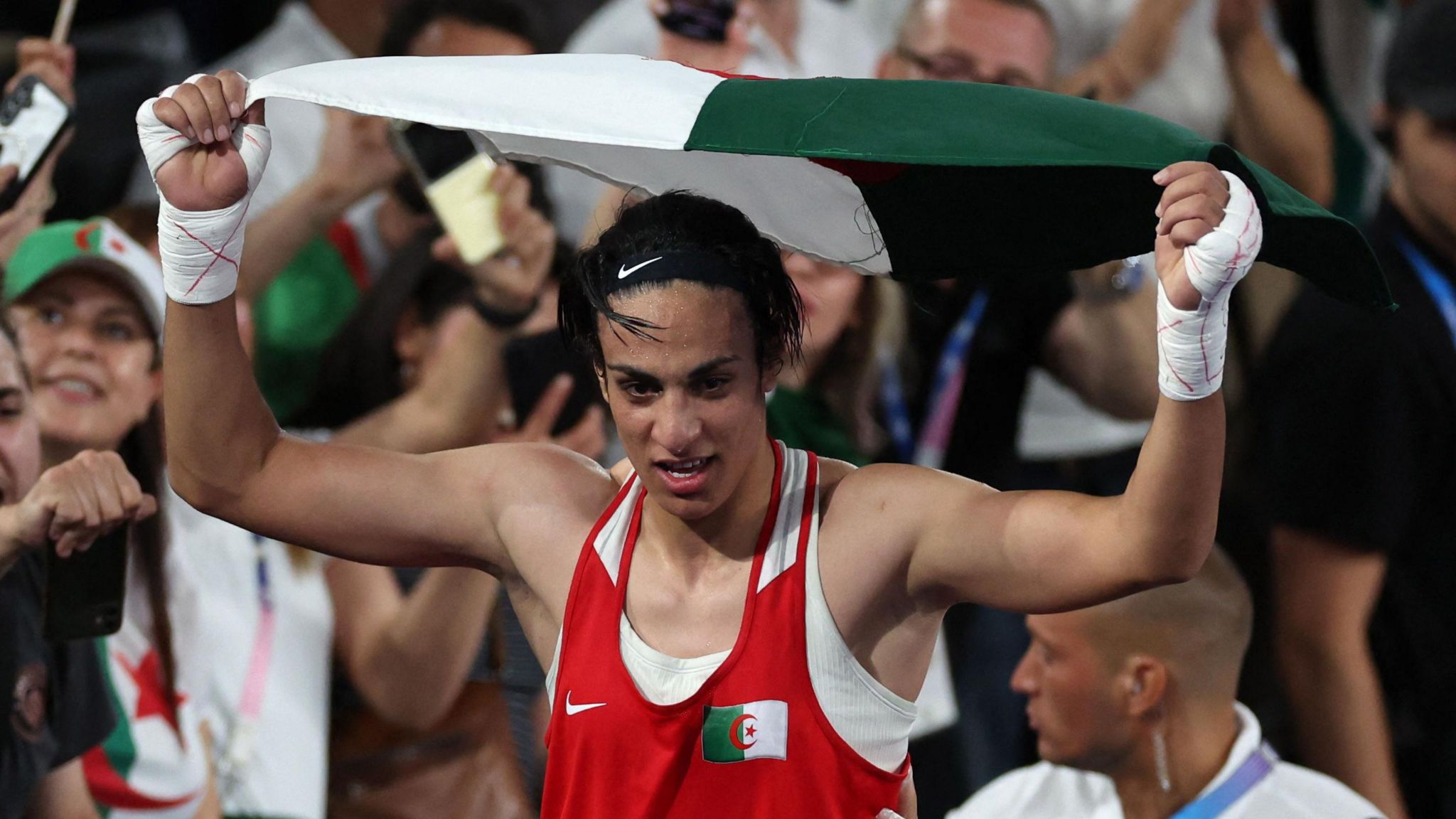 Khelif is carried on shoulders of coach