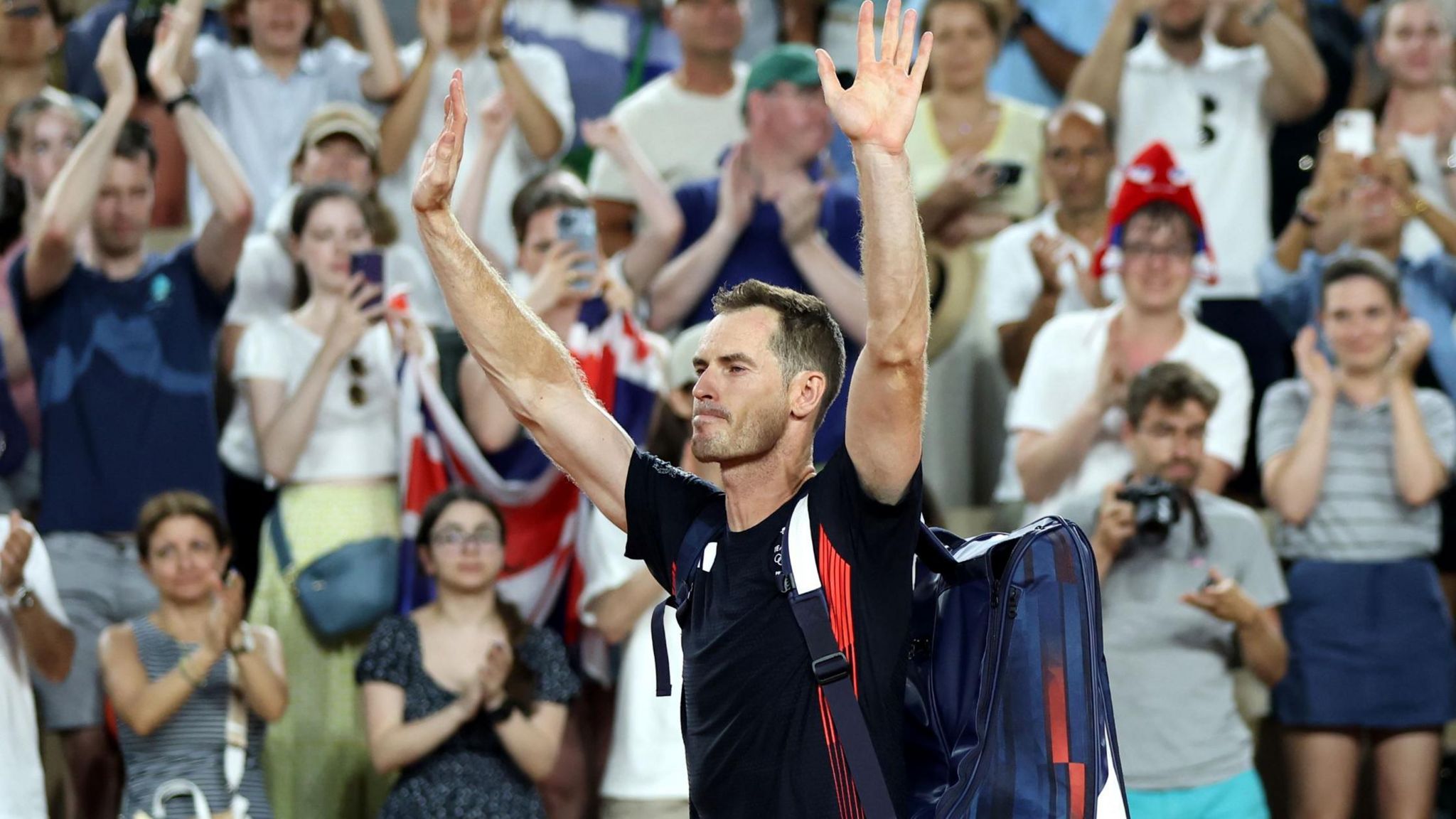 Andy Murray waves goodbye