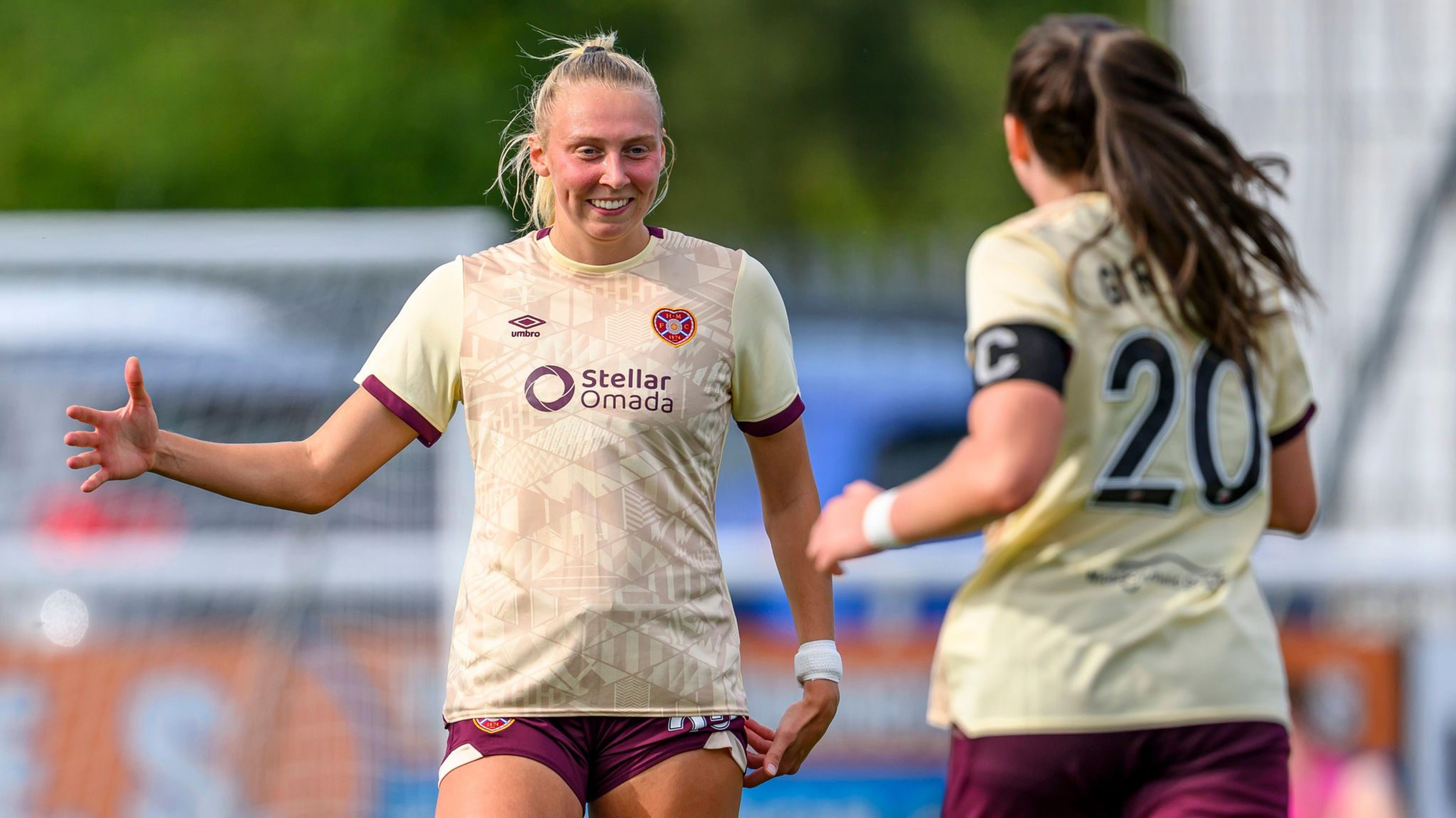 Jackie Richards celebrates after scoring for Hearts