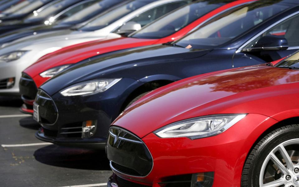 A row of electric Tesla cars