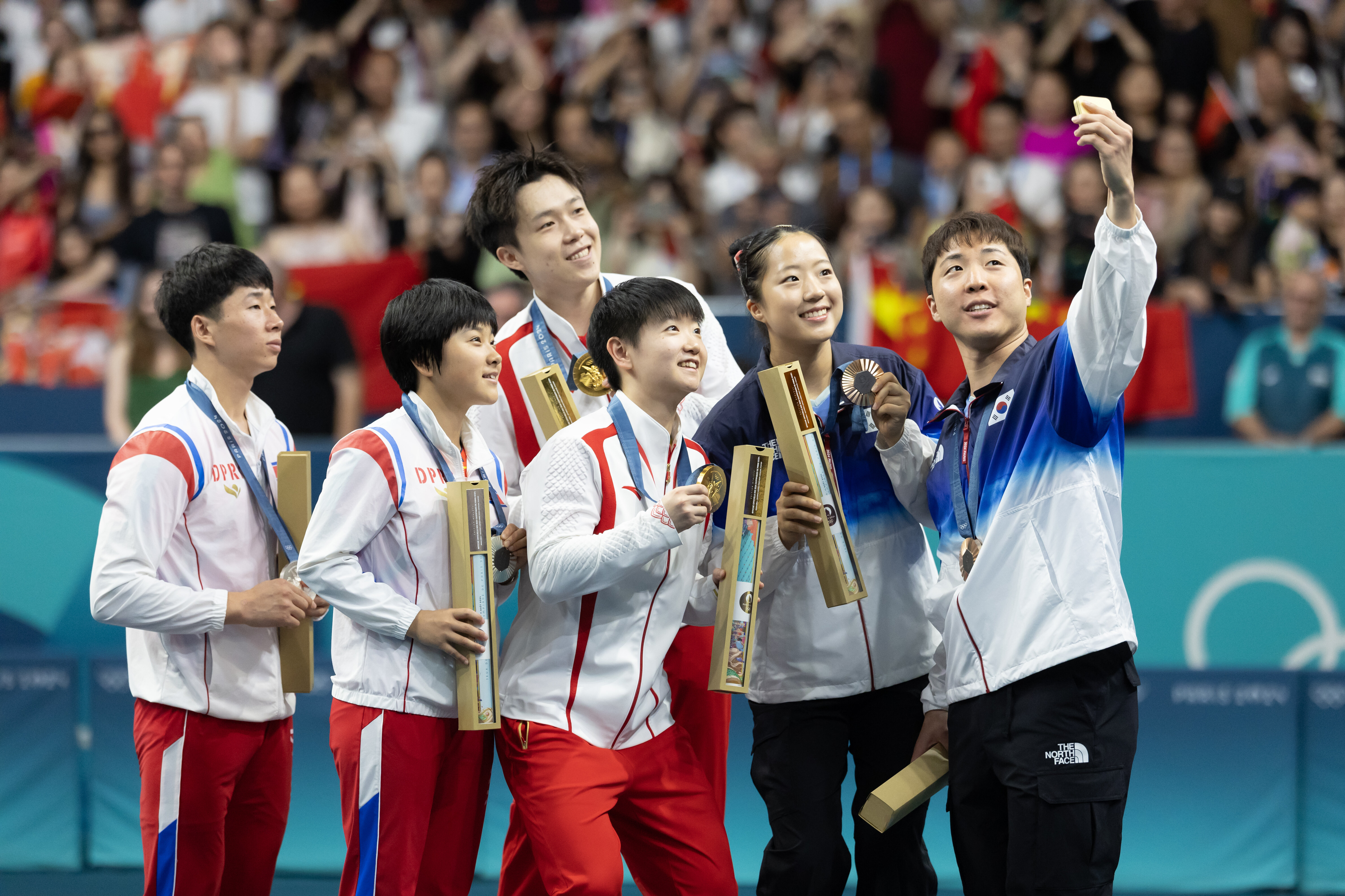 The selfie that's been hailed as showing the "true spirit" of the Olympics.