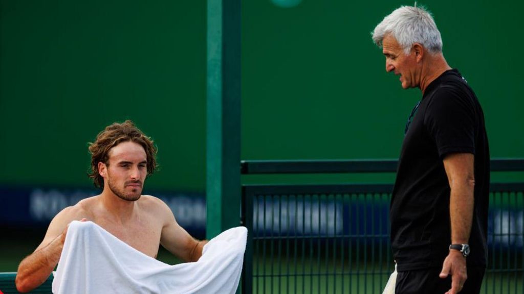 Stefanos Tsitsipas of Greece cools down after a practice session with his father and coach, Apostolos Tsitsipas 