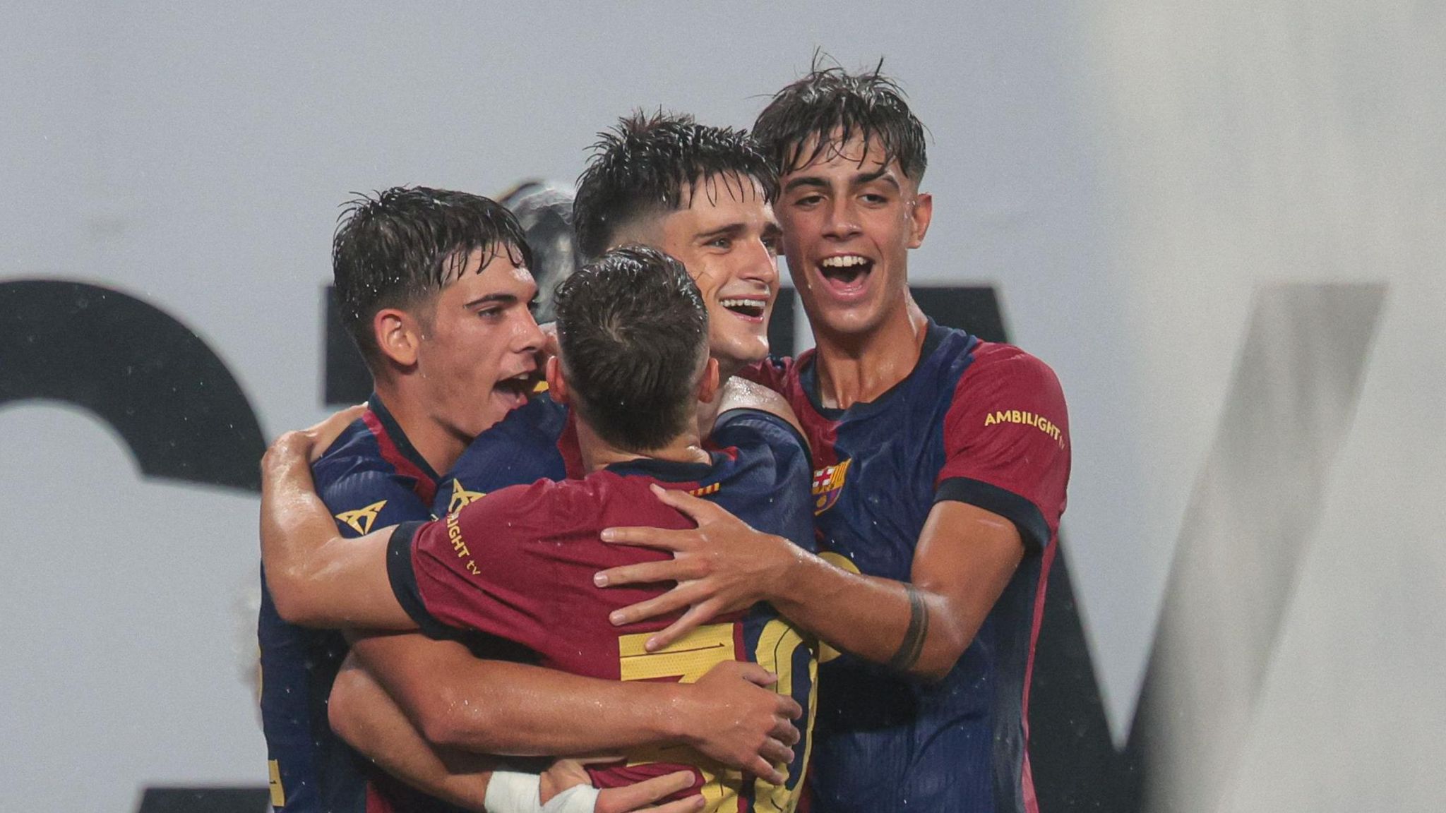 Barcelona players celebrate Pau Victor's goals against Real Madrid in US friendly