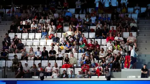 PA Media Empty seats pictured during a sporting event at the Paris Olympics