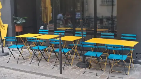 BBC A row of empty restaurant tables