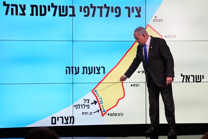 Israeli Prime Minister Benjamin Netanyahu stands before a map of the Gaza Strip, telling viewers that Israel must retain control over the "Philadelphi corridor," a strategic area along the Palestinian territory's border with Egypt, during a news conference in Jerusalem on Sept. 2, 2024.