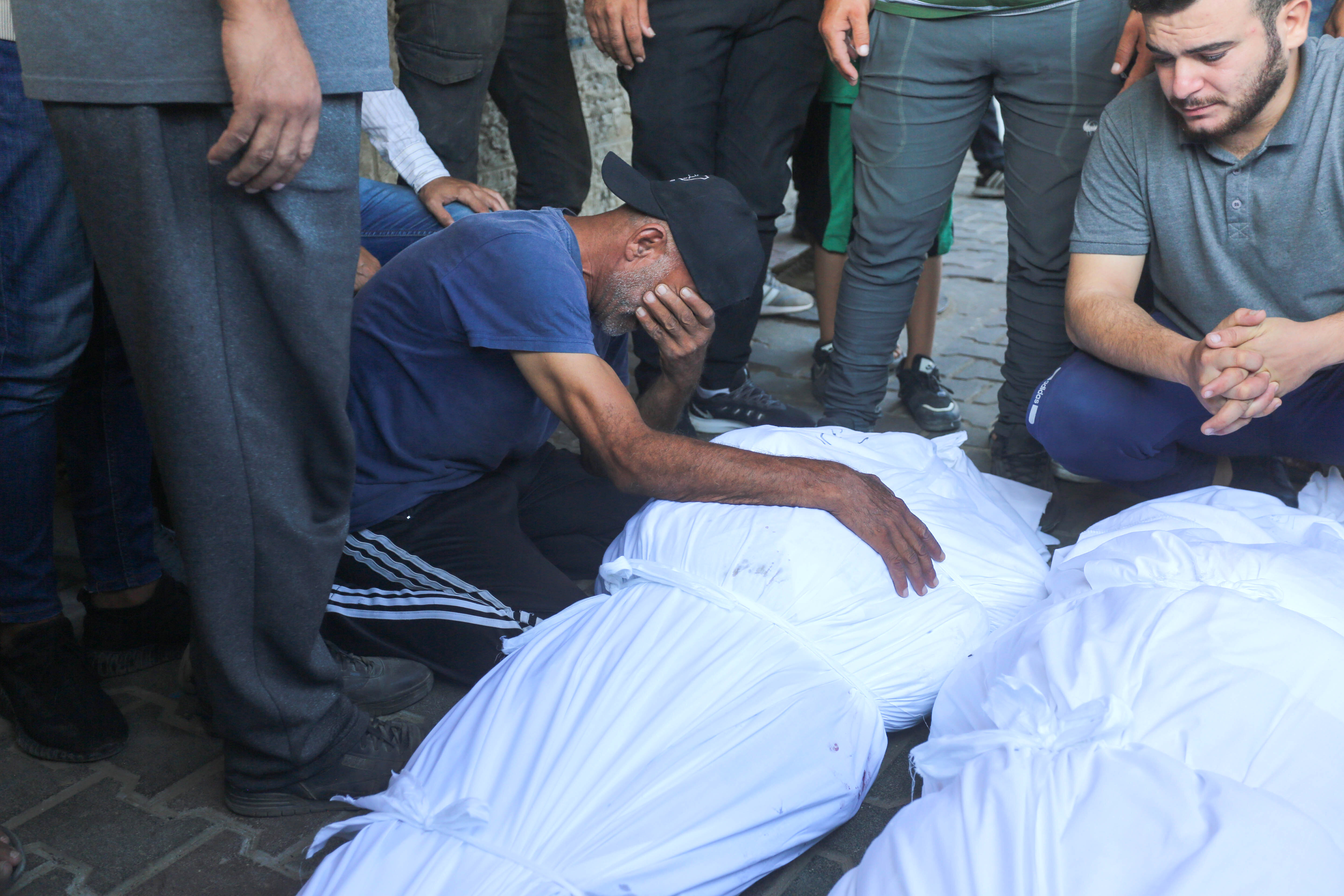 DEIR AL BALAH, GAZA - SEPTEMBER 7: Bodies of Palestinians who lost their lives after the Israeli attack, are brought to al-Aqsa Martyrs Hospital in Deir Al Balah, Gaza on September 06, 2024. Several people, including children, were killed and wounded in an Israeli army attack on the Buraij refugee camp in the central Gaza Strip. (Photo by Ashraf Amra/Anadolu via Getty Images)