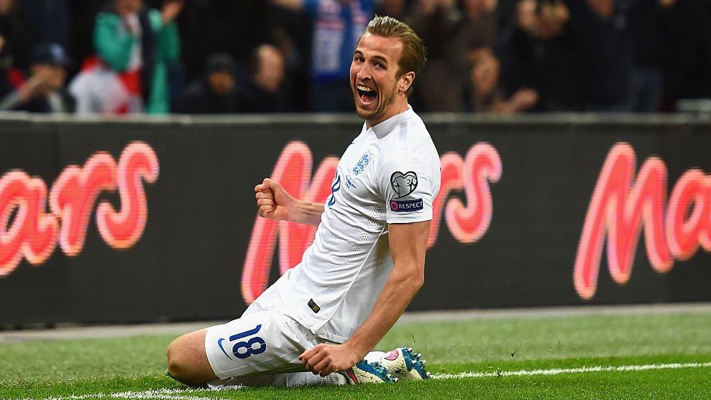 Harry Kane celebrates scoring on his England debut