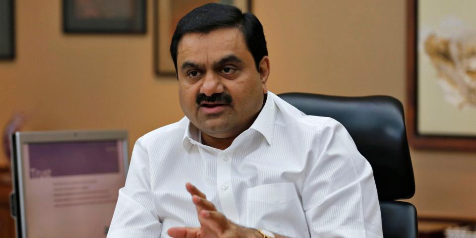 Gautam Adani talking while seated.