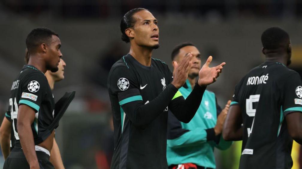 Virgil Van Dijk applauds Liverpool supporters