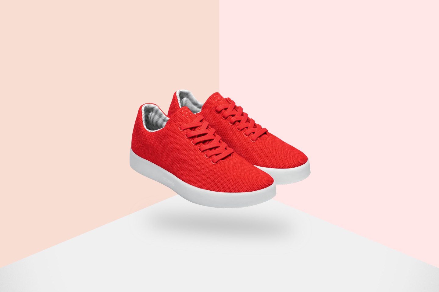 Photo of red Atoms sneakers