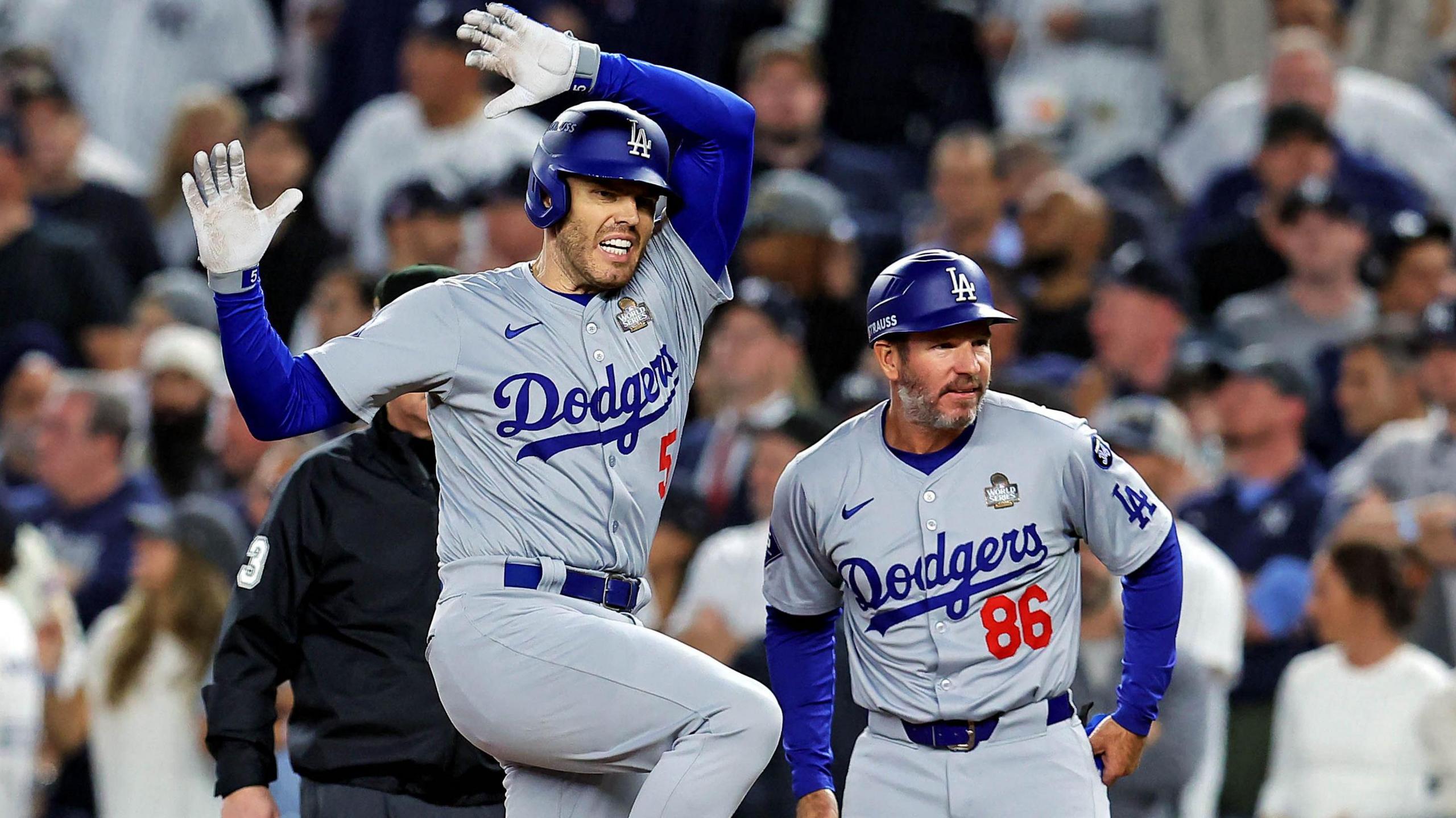 Los Angeles Dodgers first baseman Freddie Freeman celebrates after driving in two runs in the fifth inning