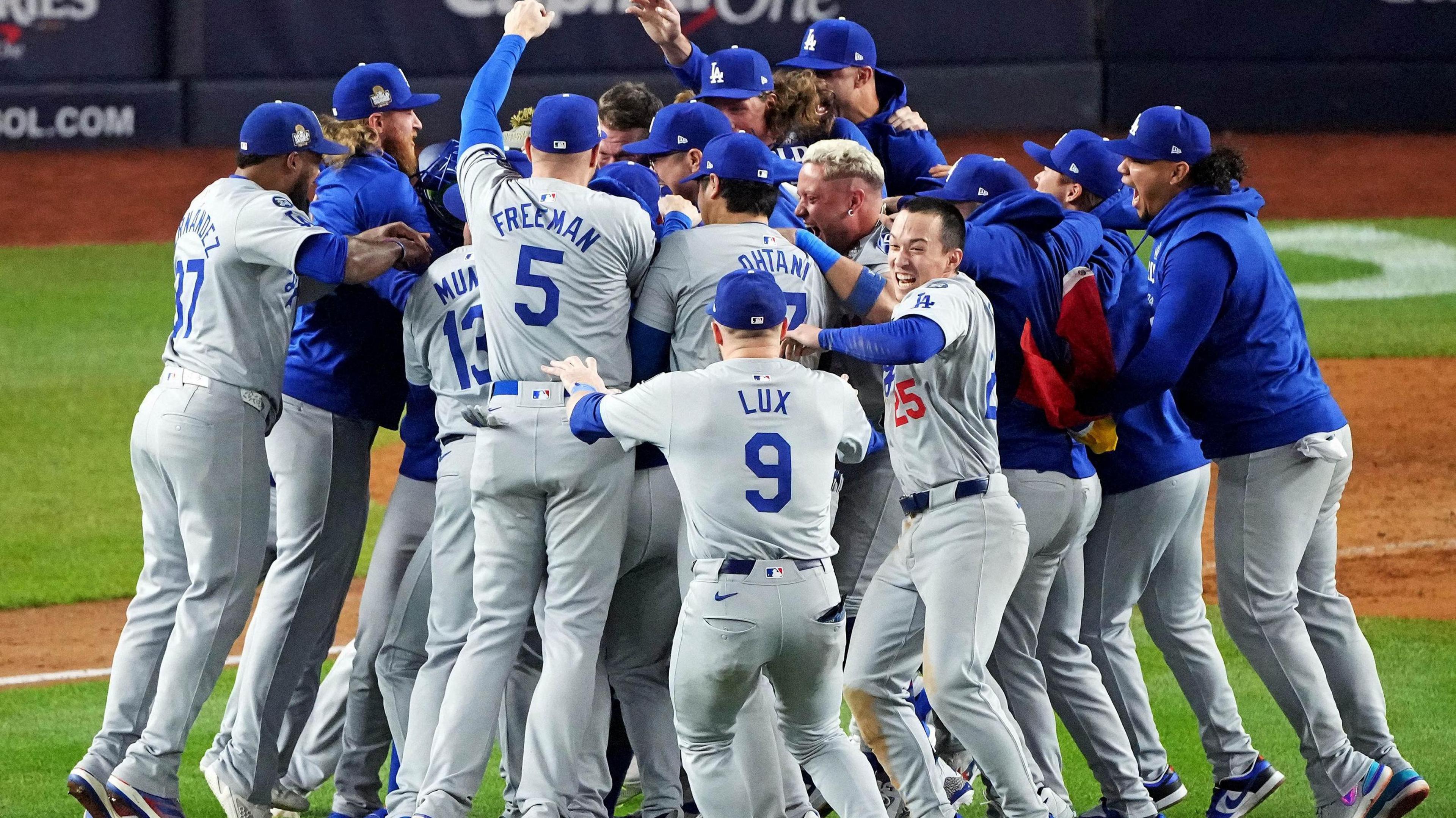 Los Angeles Dodgers players celebrate after winning the World Series