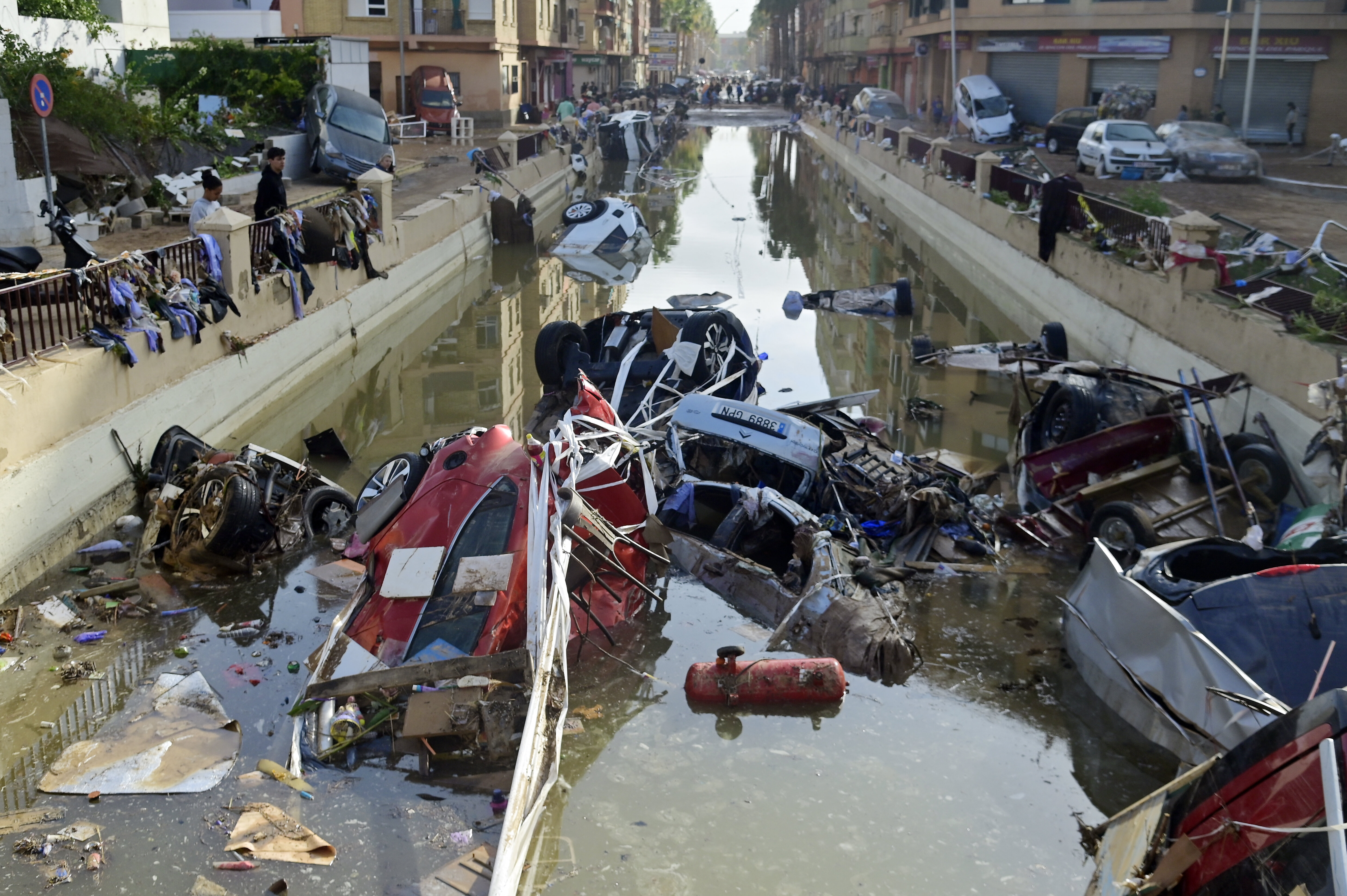 Wreckage of cars remain submerged in the water after flash floods affected the town of Alfafar, in the region of Valencia, eastern Spain