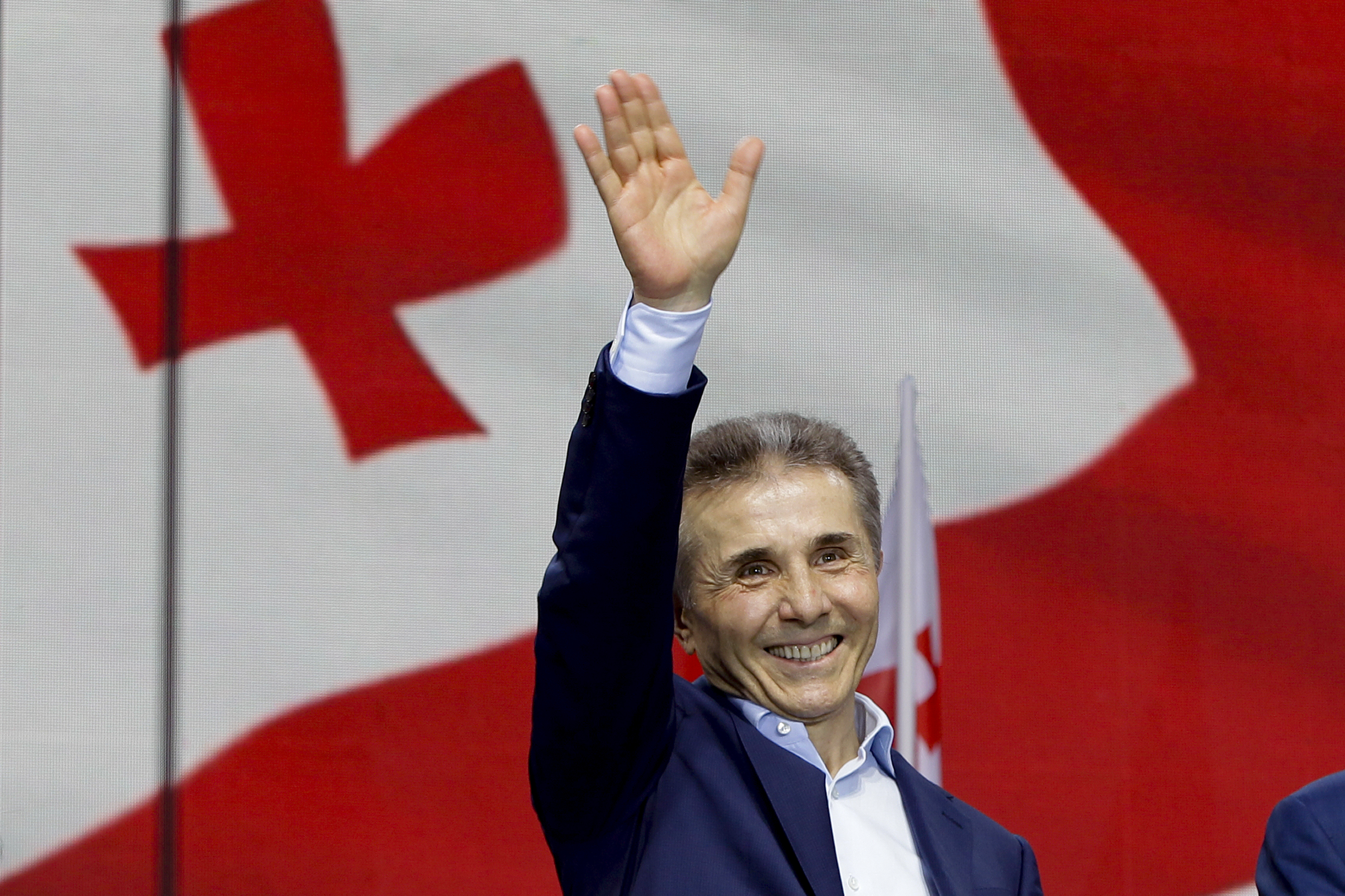 FILE - Billionaire Bidzina Ivanishvili, leader of the Georgian Dream party, greets demonstrators during a rally in Tbilisi, Georgia, on April 29, 2024. (AP Photo/Shakh Aivazov, File)