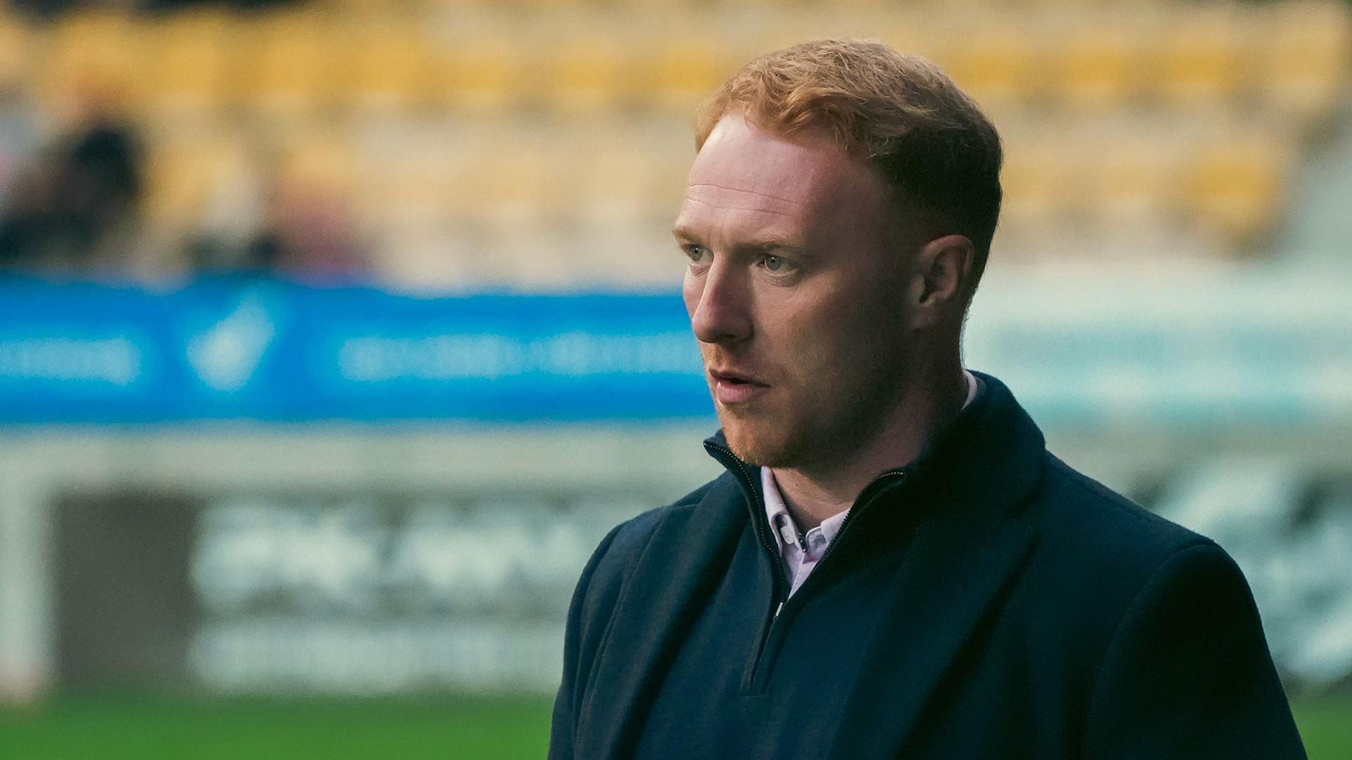 A close up of SJK Seinajoki manager Stevie Grieve at a football match