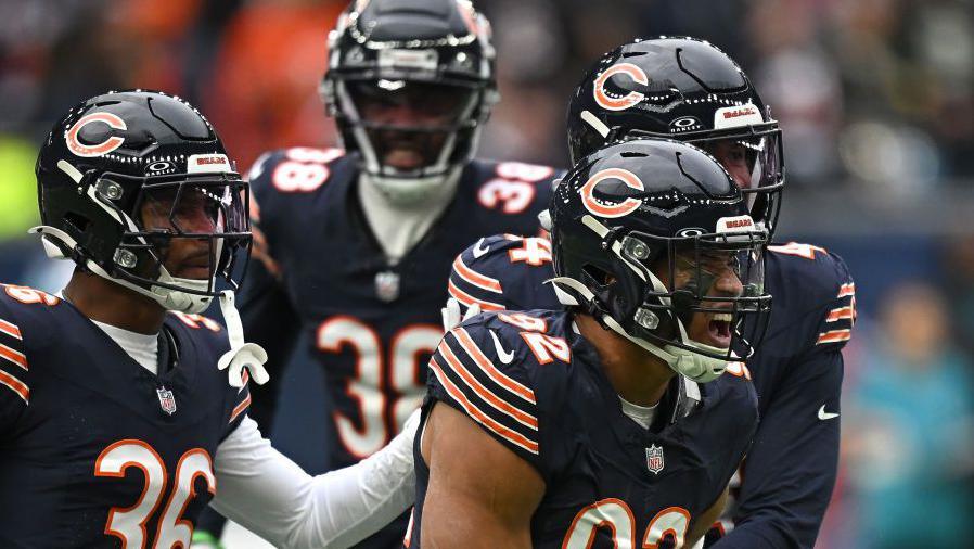 Daniel Hardy celebrates with his Chicago Bears team-mates