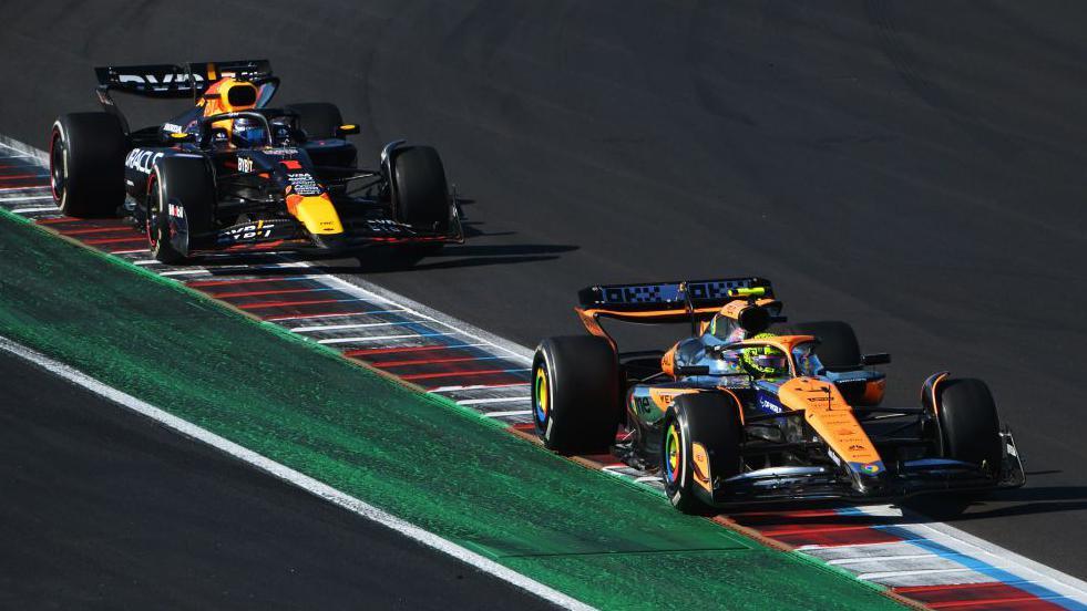 Lando Norris with Max Verstappen right behind him in the US Grand Prix