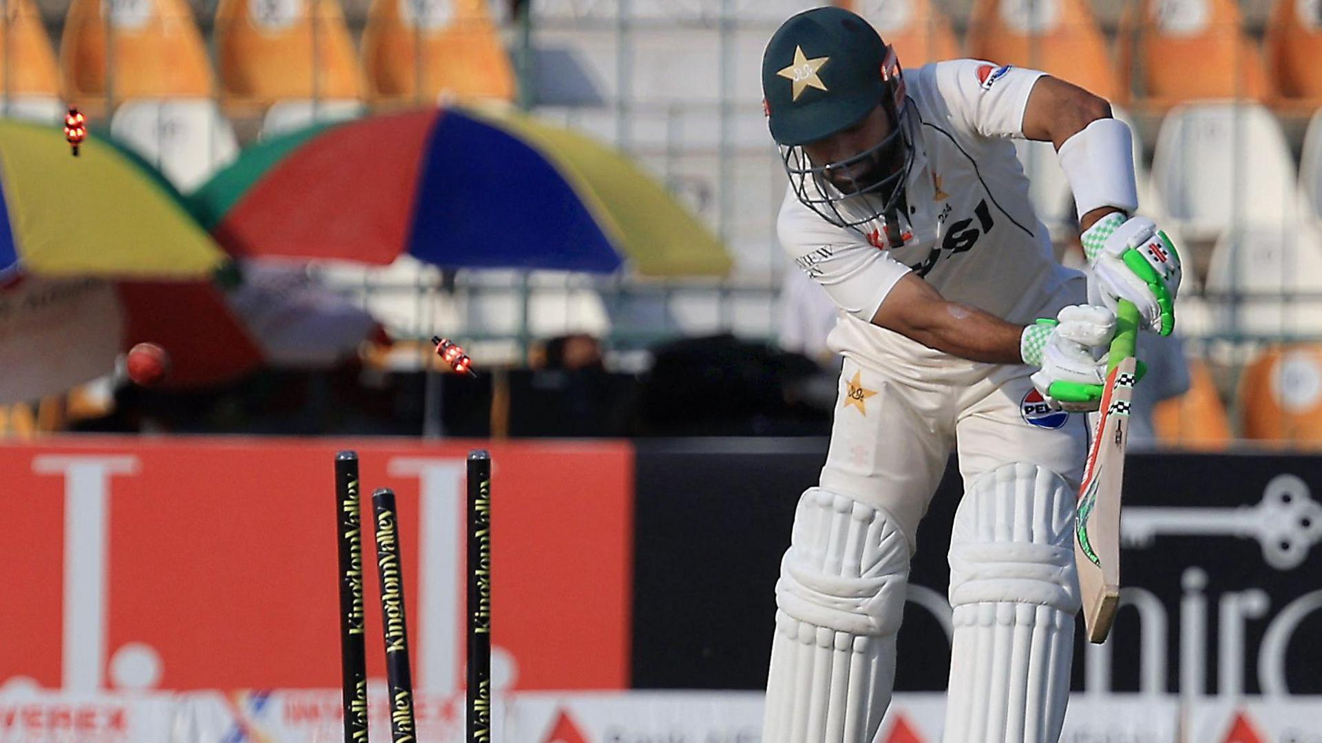 Pakistan's Mohammad Rizwan is bowled by England's Brydon Carse