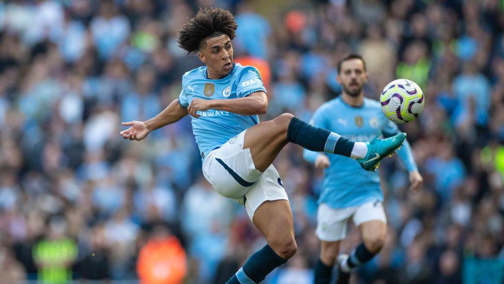 Rico Lewis in action for Manchester City