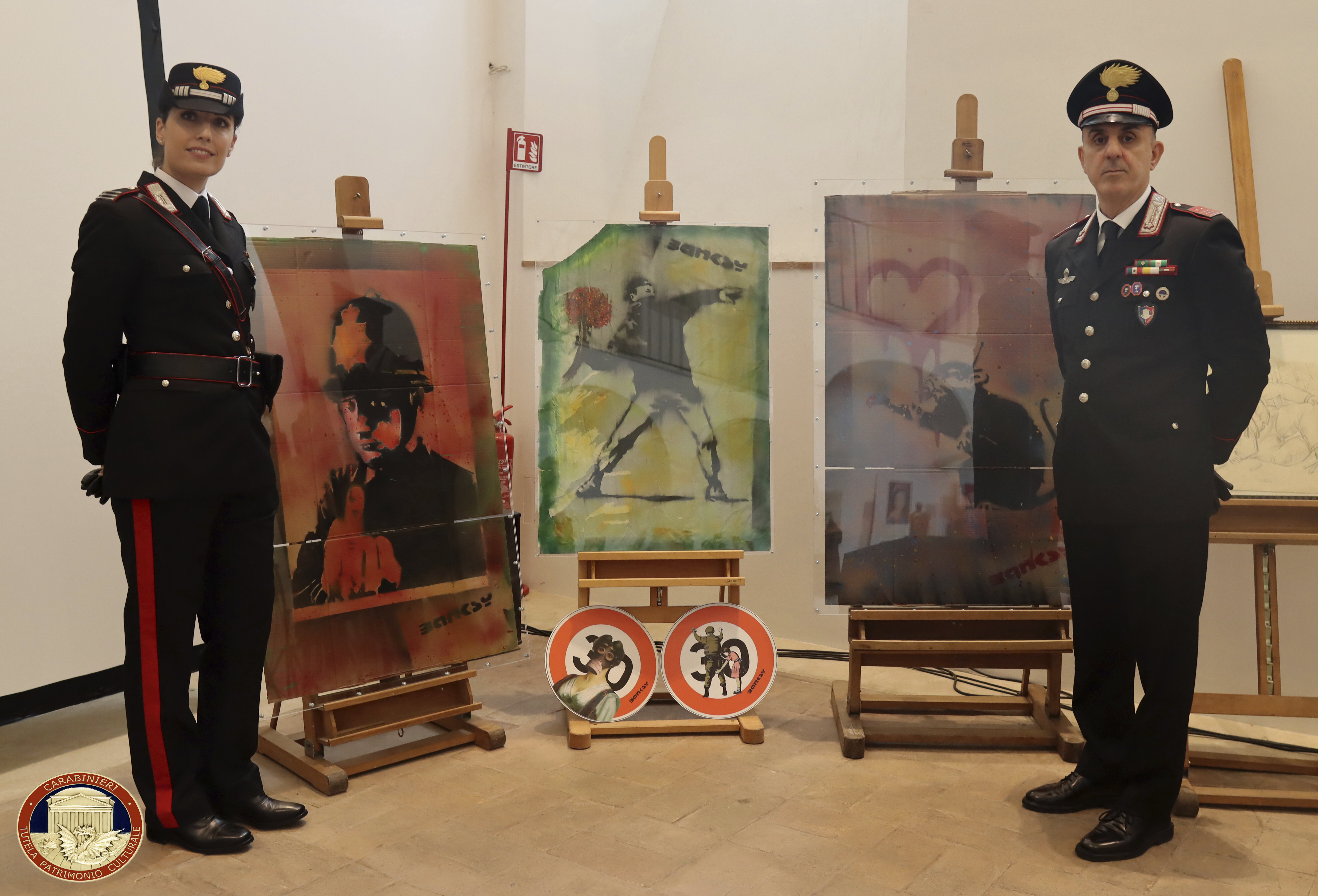 Fake Banksy artworks that were seized by police are put on show in Rome, Italy.