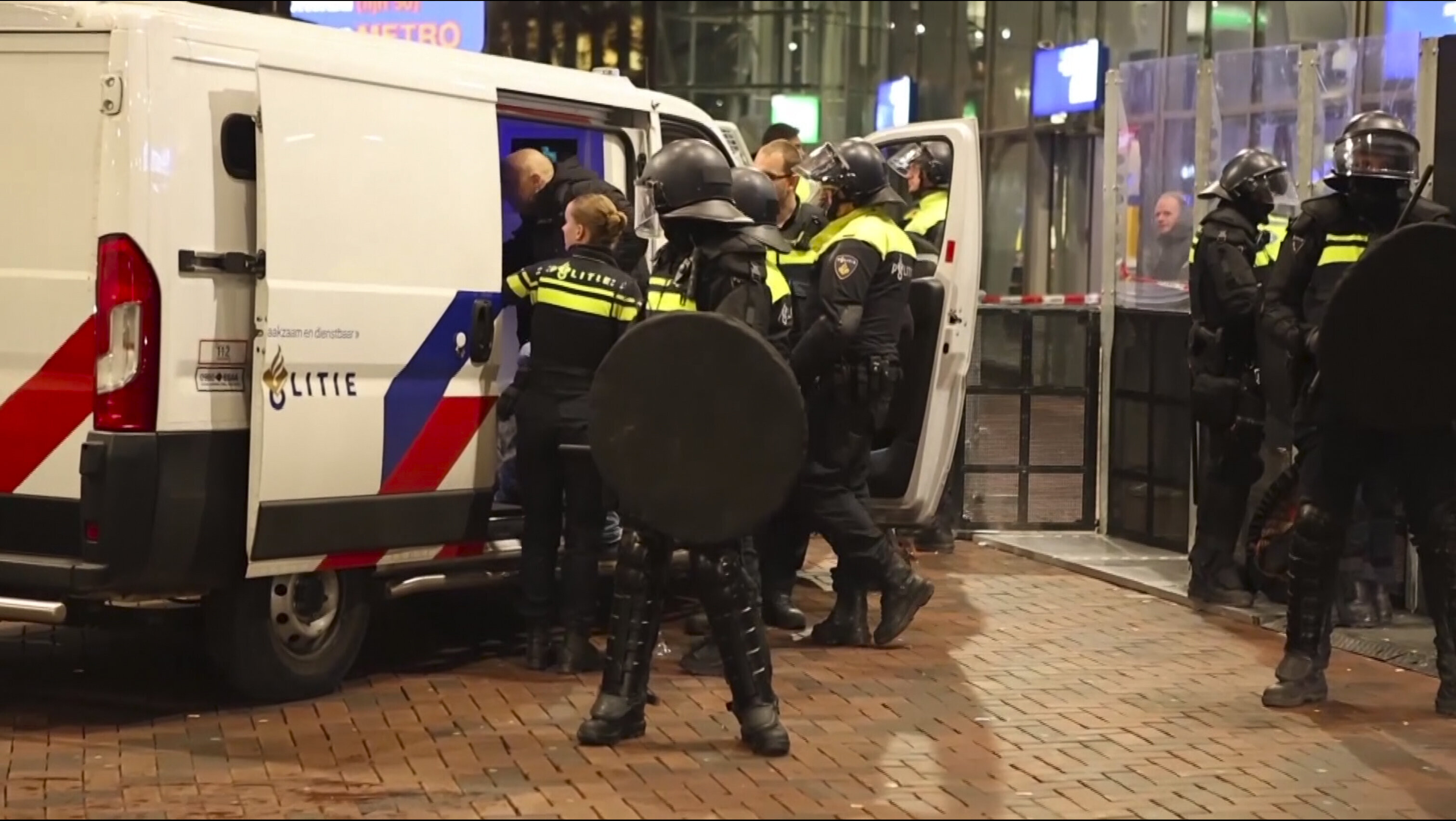 Police detain a man near the Ajax stadium after pro-Palestinian supporters marched despite a ban on pro-Palestinian demonstrations near the soccer stadium, in Amsterdam, the Netherlands.