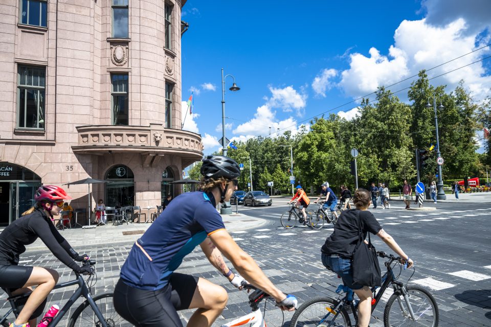 people seen cycling on a road