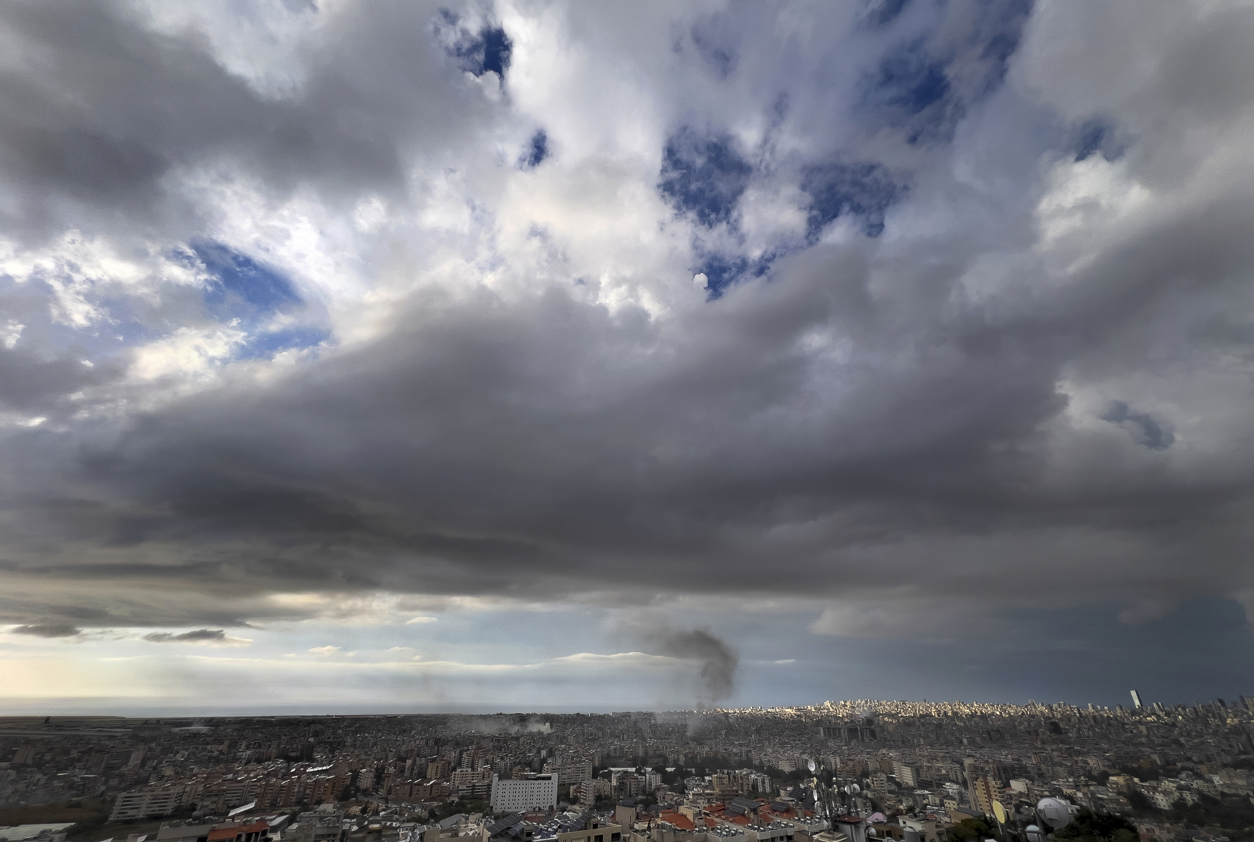 Smoke rises from buildings hit in Israeli airstrikes in Dahiyeh, in the southern suburb of Beirut, Lebanon, Sunday, Nov. 17, 2024. (AP Photo/Hussein Malla)