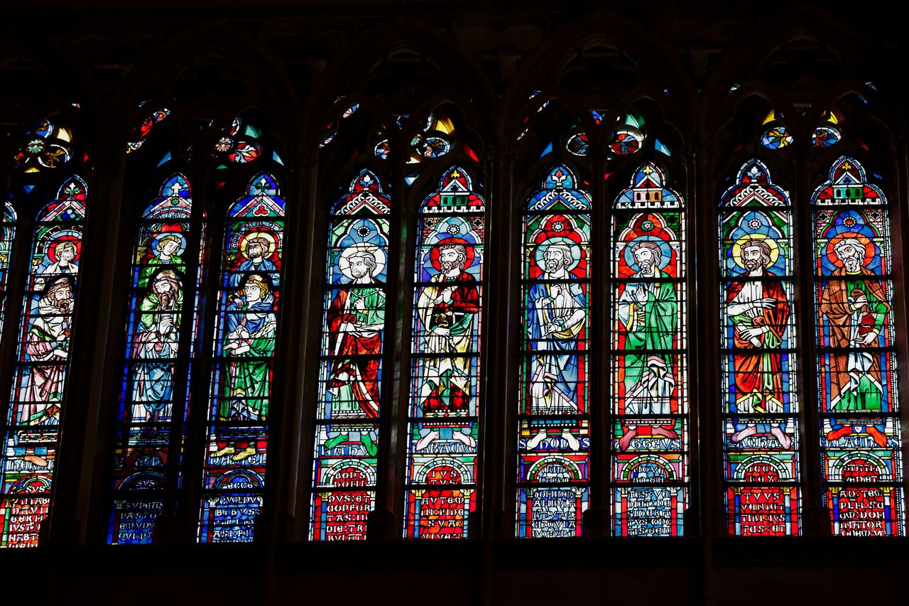 Newly cleaned stained glass windows are seen inside the cathedral.