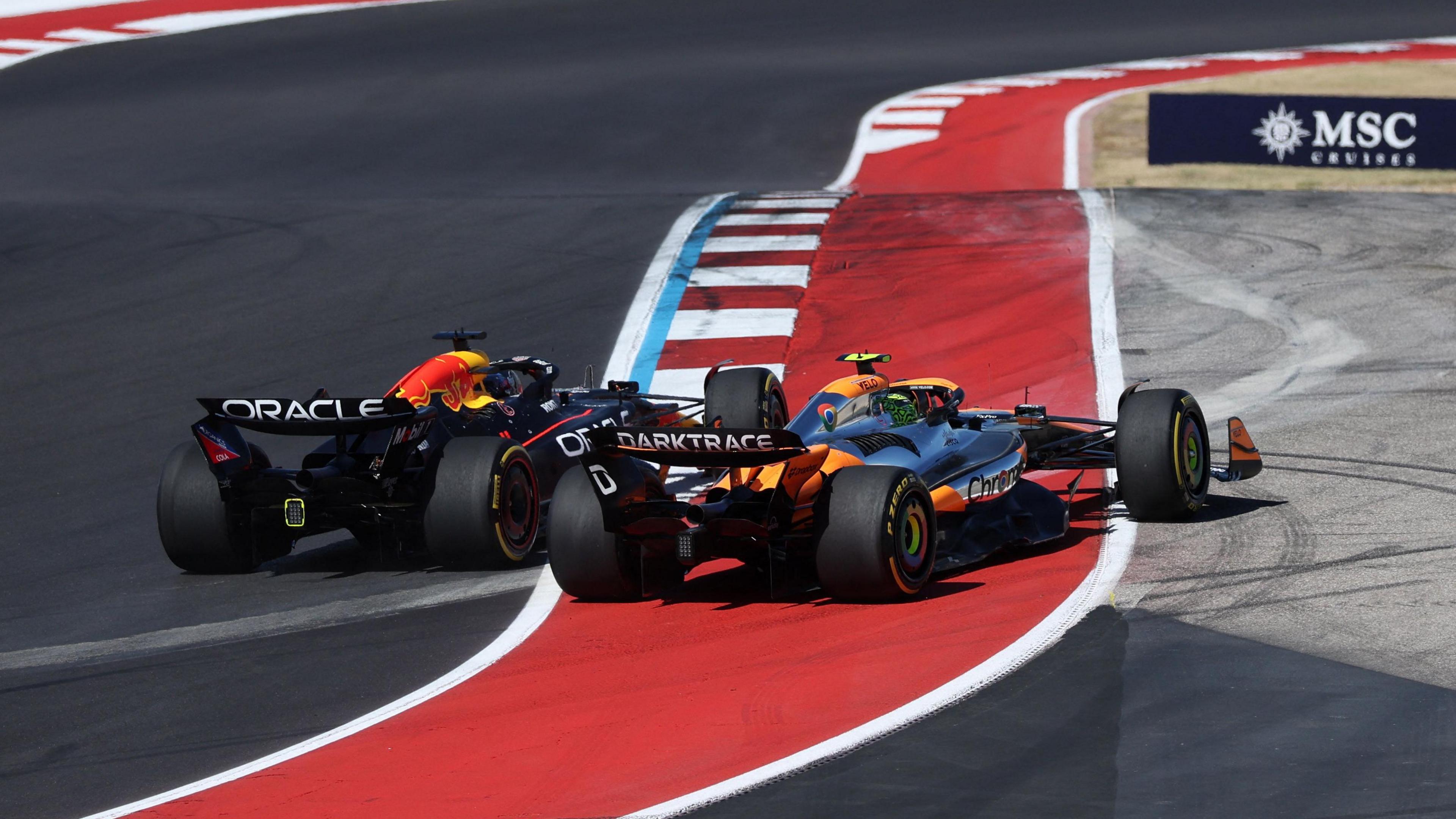 Max Verstappen and Lando Norris leave the track during the United States Grand Prix