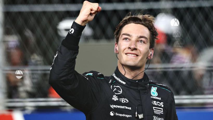 George Russell clenches his right fist in celebration after winning the Las Vegas Grand Prix