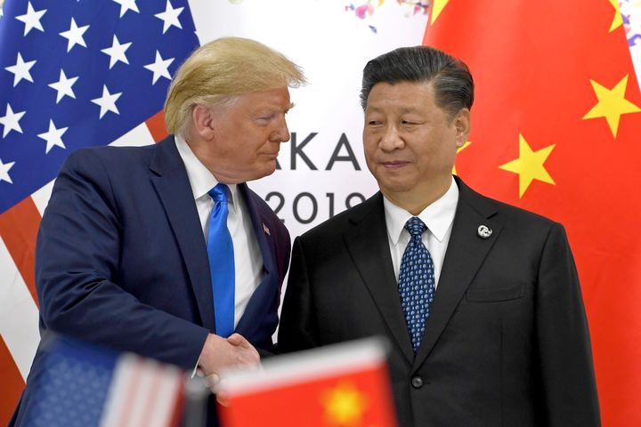 In this June 29, 2019, file photo, U.S. President Donald Trump shakes hands with Chinese President Xi Jinping during a meeting on the sidelines of the G-20 summit in Osaka, western Japan. (AP Photo/Susan Walsh, File)