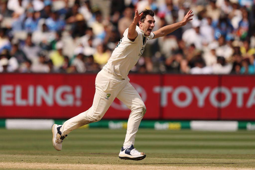 Pat Cummins celebrates a wicket v India